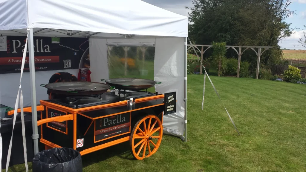 Garden Party Catering with live paella cooking