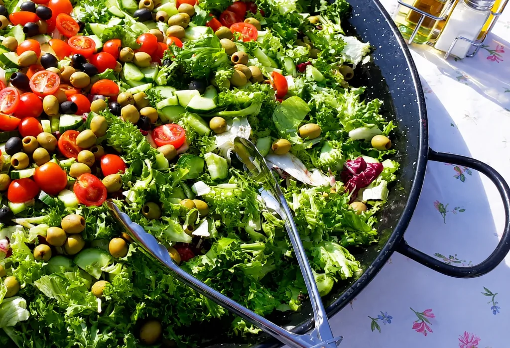 Vegan Wedding Catering fresh mixed green salad served alongside live vegan wedding catering