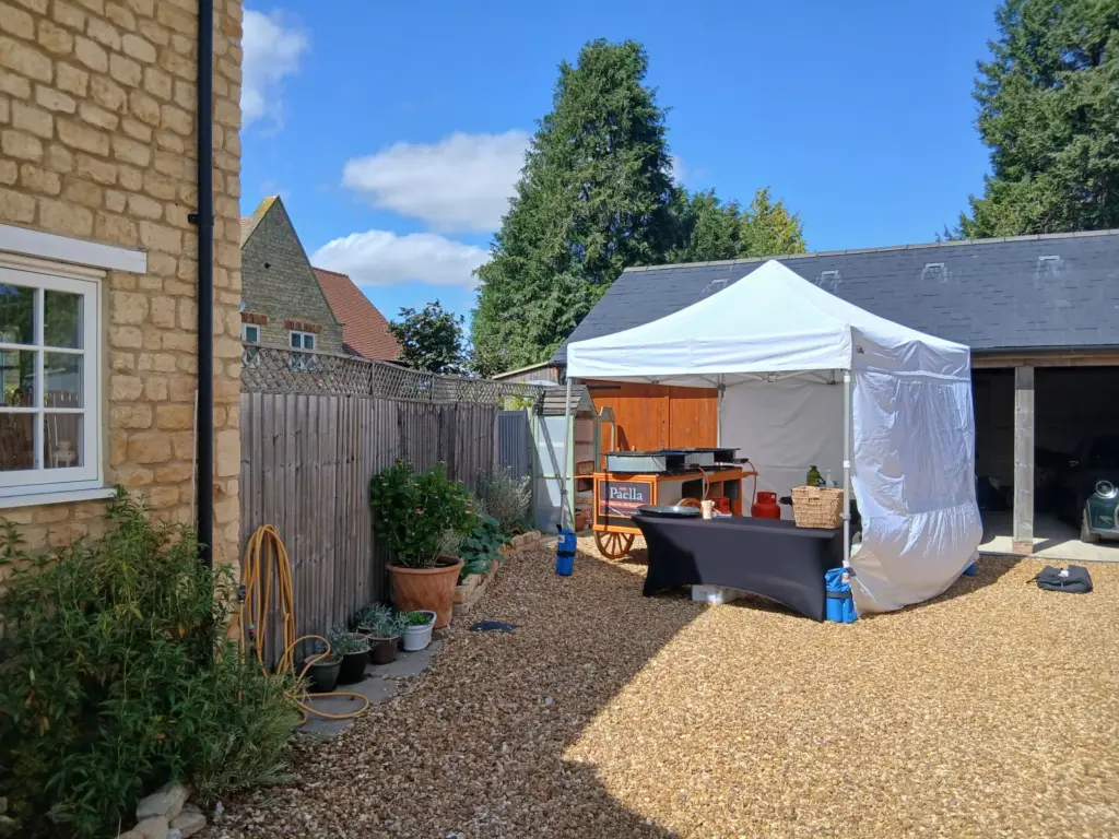 Paella catering for small gardens with our complete driveway setup at a private birthday party