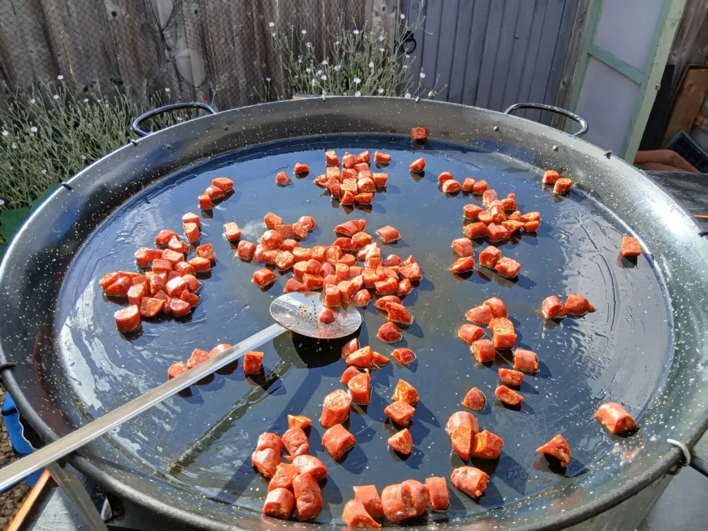 Live birthday party paella catering in progress