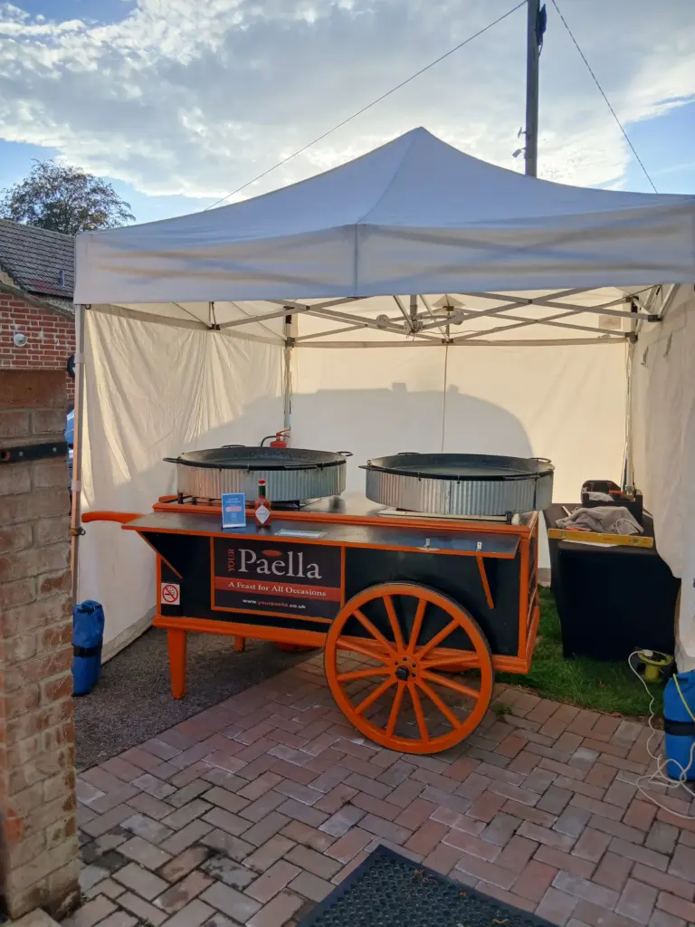Mobile paella catering setup at a private party in Warminster Wiltshire
