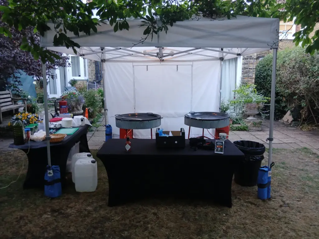 Your Paella outdoor catering setup at a private garden party in London
